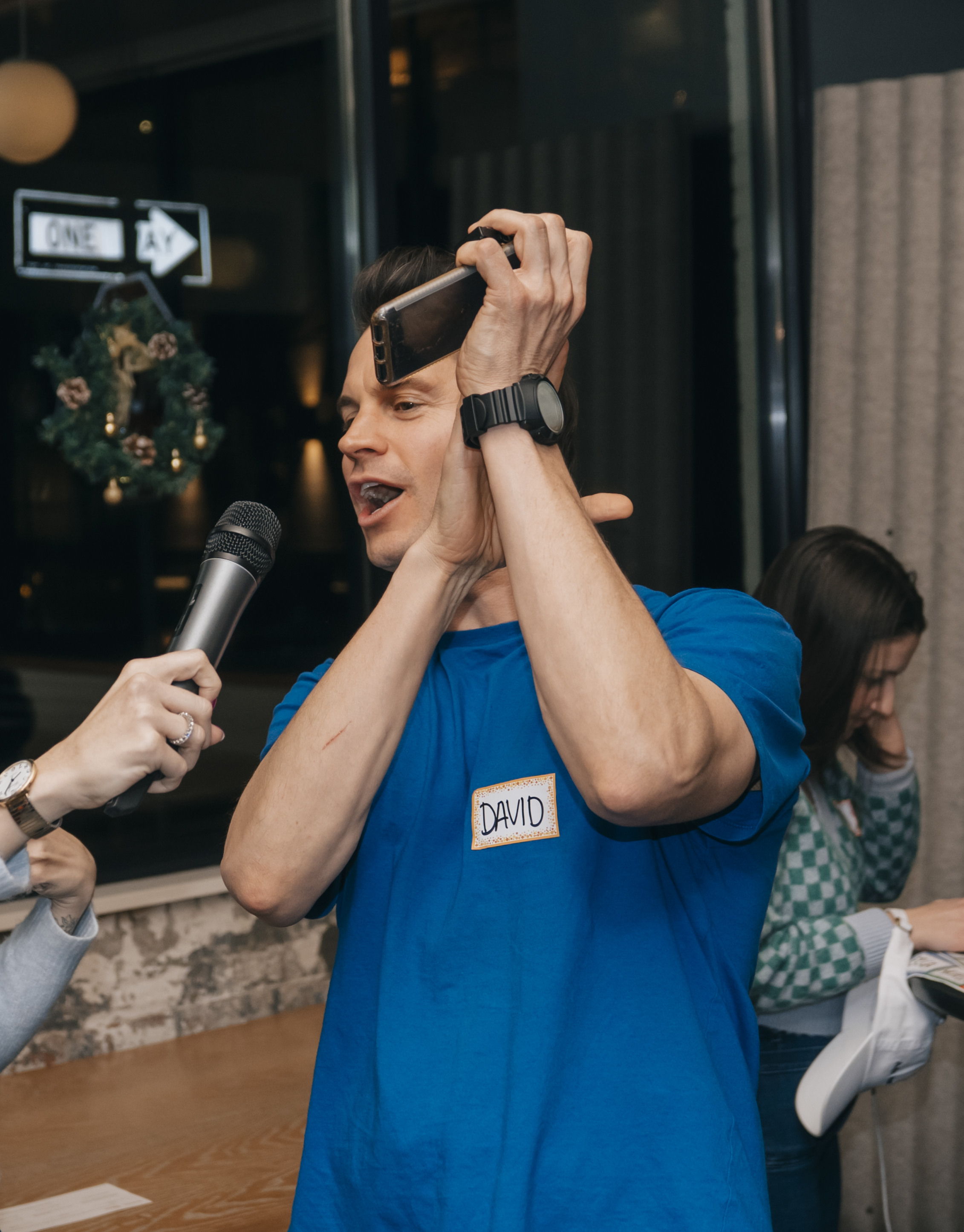Attendee speaking with mic at Anti-Networking NYC