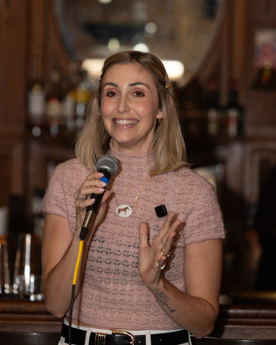 Carly Valancy welcoming the room at Anti-Networking Denver