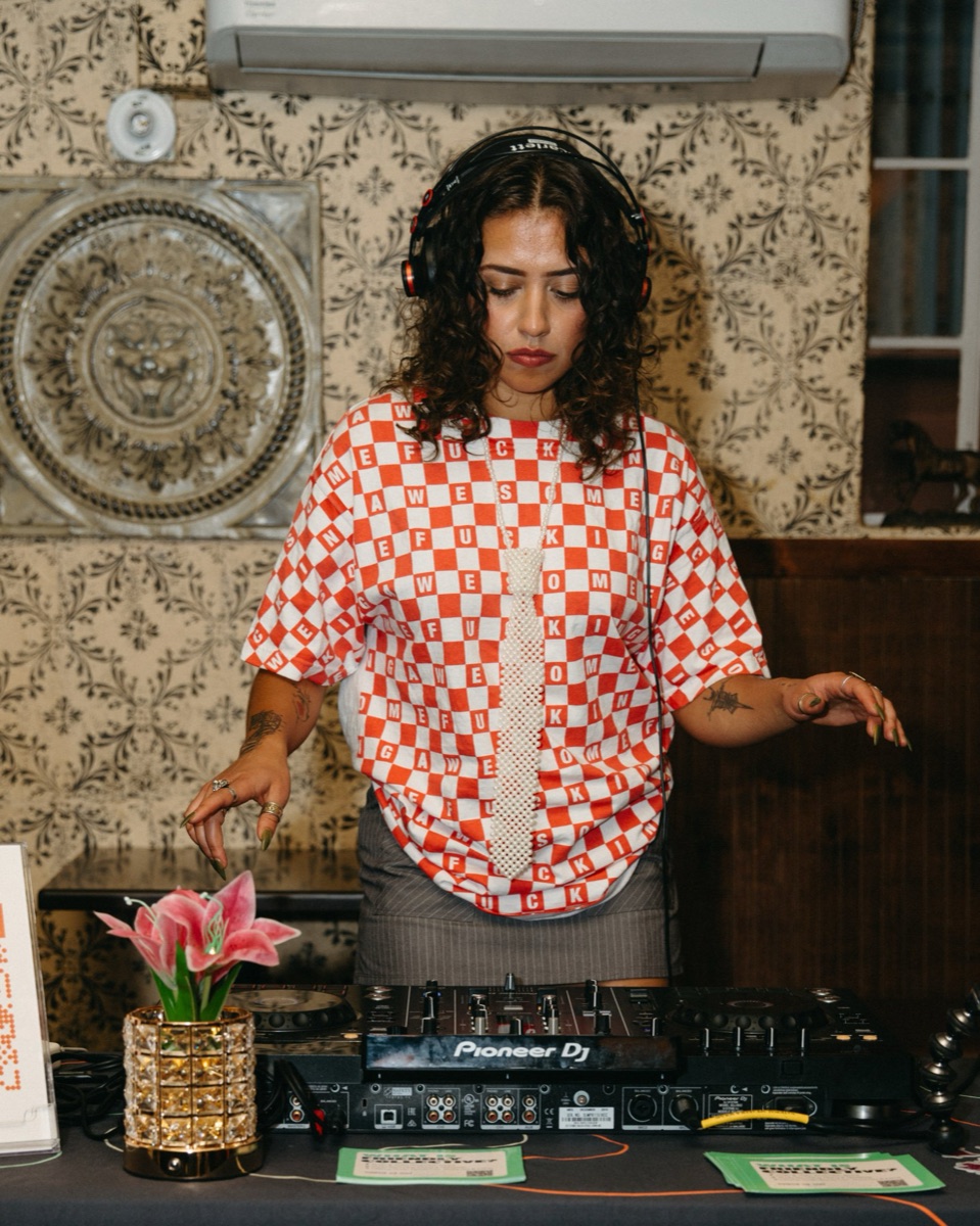 DJ on the decks at Anti-Networking Denver