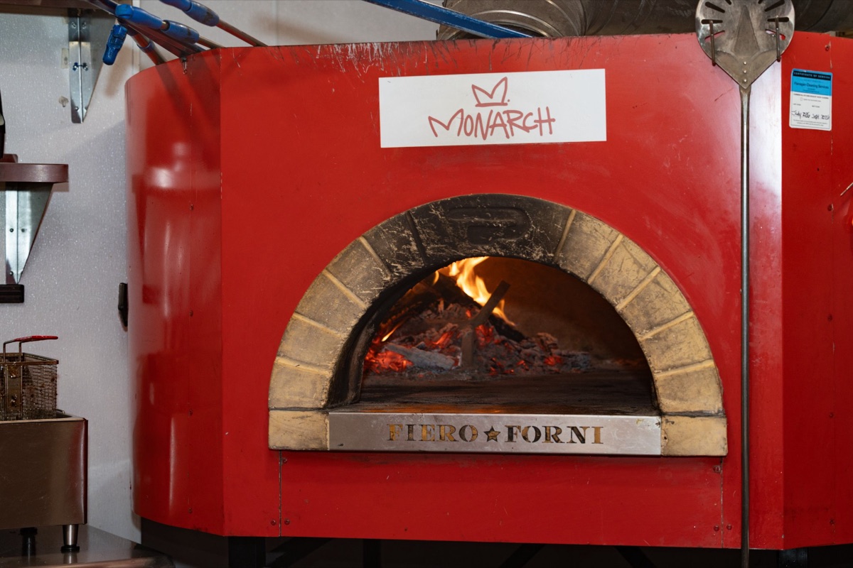 Wood-fired pizza oven at Anti-Networking Denver